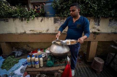 A street vendor sells Ghota, a cannabis-based drink, on the occasion of Maha Shivaratri, on the