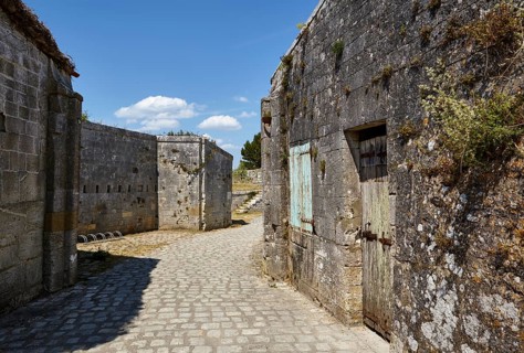 Walls of old fortifications and a cobblestone path on the island of Île-d'Aix, Charente-Maritime,