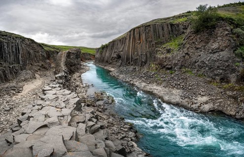 Stuðlagil Canyon, turquoise river between basalt columns, Egilsstadir, Iceland, Europe