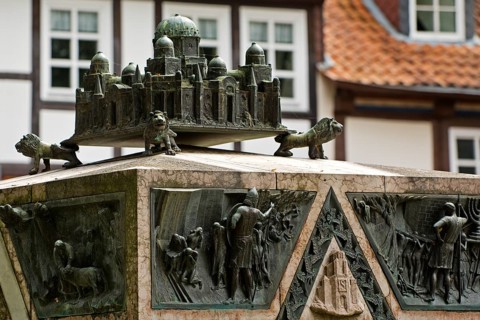 Bronze sculpture with a miniature of the city of Jerusalem on the ashlar of the synagogue memorial,