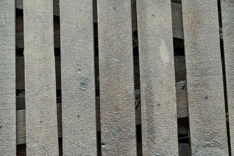 Wooden boards covered with hoarfrost. Abstract rustic background, winter concept. Frost texture,