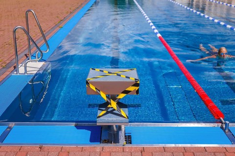 Hagen, North Rhine-Westphalia, Germany - Blocked-off starting block at the edge of the swimming