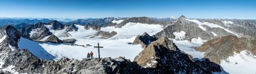 Panorama at the summit of the Wilder Freiger with summit cross and with glacier Übeltalferner and