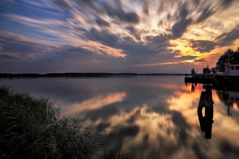 Harbour entrance at the Peenestrom, sunset, backlight, long exposure, marina, fishing port