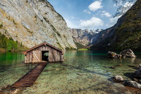 Boat shed dock on Obersee lake. Bavaria, Germany, Europe