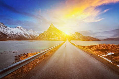 Road in Norwegian fjord on sunset. Lofoten islands, Norway, Europe