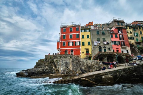 RIOMAGGIORE, ITALY, APRIL 25, 2019: Riomaggiore village popular tourist destination in Cinque Terre