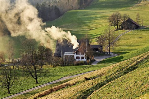 Farmhouse with smoking chimney, Hirzel, Canton Zurich, Switzerland, Europe