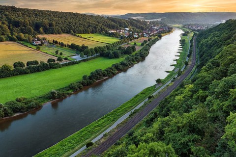 View from the skywalk over the Weser towards Herstelle and Würgassen, evening sky, Beverungen,