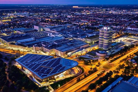 MUNICH, GERMANY, JULY 08, 2018: Aerial view of BMW Museum and BWM Welt and factory and Munich from