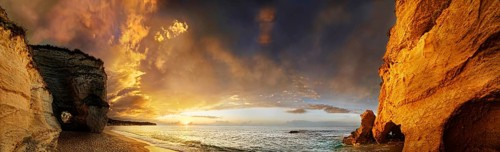 Sunset panorama on Mare di Tropea beach under luminous sky, Tropea, Vibo Valentia, Calabria,