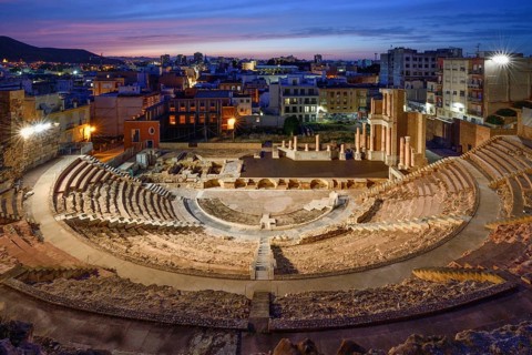 Teatro Romano, blue hour, Roman amphitheater, in the old town of Cartagena, Murcia region, Spain,