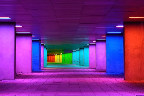 Colorful mulitcolord illuminated gallery tunnel rainbow passage under NAI building, Nederlands