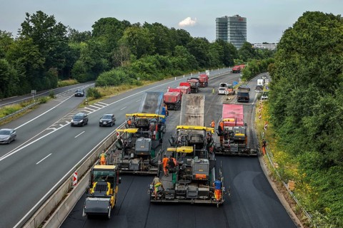 Essen, North Rhine-Westphalia, Germany, road construction, asphalt pavers and road rollers laying