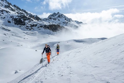 Ski tourers on the Grisons Haute Route, Albula Alps in winter, Rhaetian Alps, Grisons, Eastern