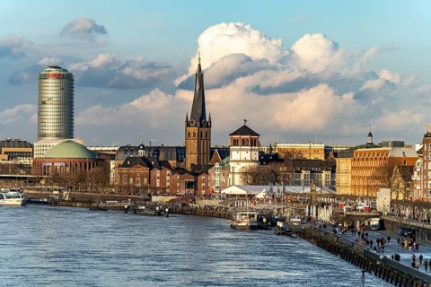 City view with Rhine promenade, St. Lambert's Basilica, castle tower, Tonhalle and Ergo Tower in