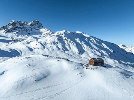 Alpine panorama, aerial view with Kesch hut, Alpine Club hut of the SAC in winter, Albula Alps,