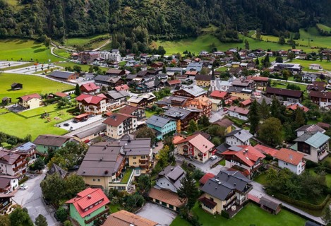 Drone image, residential buildings, view of village with parish church, Dorfgastein, Gasteinertal,