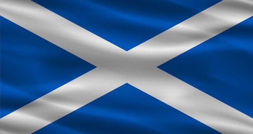 Scottish flag with fabric texture. Realistic flag of Scotland waving
