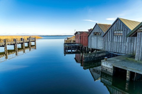 Boathouses in the small harbour of Althagen, Ahrenshoop, Mecklenburg-Vorpommern, Germany, Europe