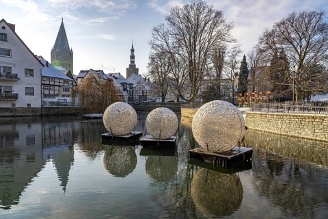 City view with decorative baubles and Soest lettering on the large pond in Soest, North