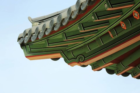 Detail on the roof with decorations from the temple, pavilion plum arbour, wooden construction,
