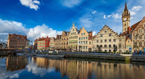 Europe Belgium medieval town travel background, panorama of Ghent canal and Graslei street on