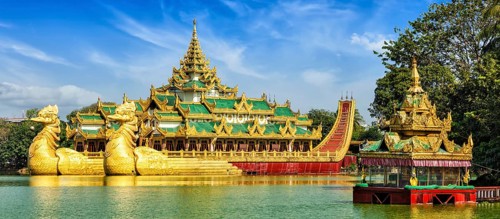 Panorama of Yangon icon landmark and tourist attraction: Karaweik, replica of a Burmese royal barge