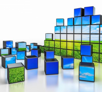 Ecology environmetal nature protection concept, cubes with beautiful landscape on white reflective