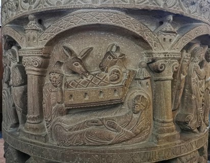Romanesque baptismal font from 1129 in the former collegiate church of St. Boniface, relief