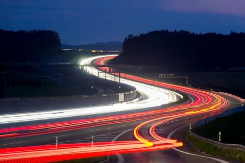 Tracers on the A8 motorway, winding road, evening, long exposure, Swabian Alb, Baden-Württemberg,