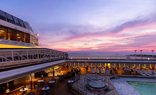 Cruise ship at sunset on vacation around Caribbean islands and Panama Canal in Central America