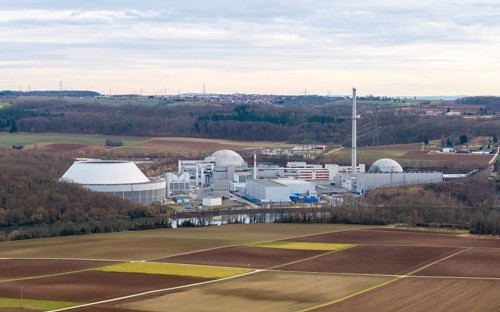 The decommissioned Neckarwestheim nuclear power plant lies in the middle of vast fields and forests