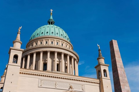 Close-up of a cathedral with a green dome under a clear sky, St. Nikolai Church, Alter Markt,