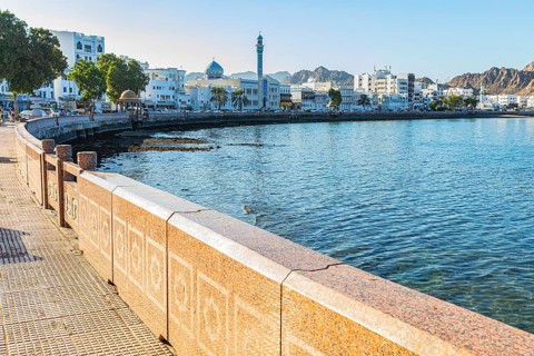 The main road Corniche leads along in an arc to the Bay of Mutrah, Muscat, Arabian Peninsula,
