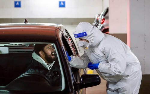 Cologne, North Rhine-Westphalia, Germany - Covid rapid test in a car park, at the Medicare test