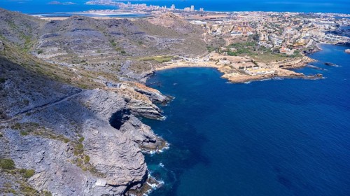 Aerial view of la manga del mar menor with its crystal clear turquoise waters gently lapping