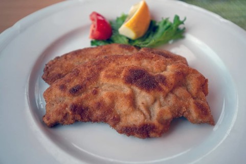 Wiener-style schnitzel served on a plate, Bavaria, Germany, Europe