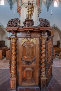 Figure of Jesus with the Lamb of God on the chancel entrance in the church of St Martin, Memmingen,