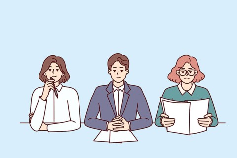 Business people from recruiting company with skeptical expression are conducting interview sitting