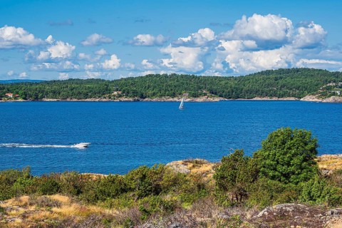 Landscape with boats on the island of Merdø in Norway