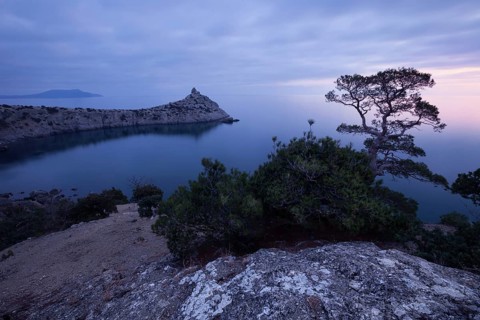 Sunset on rocky coast of Black sea. Crimea, Ukraine, Europe