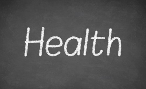 Health lesson on blackboard or chalkboard. written in white chalk