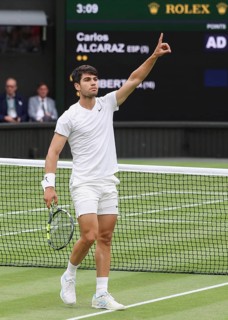 Spanish tennis player Carlos Alcaraz celebrating at the 2024 Wimbledon Championships, London,