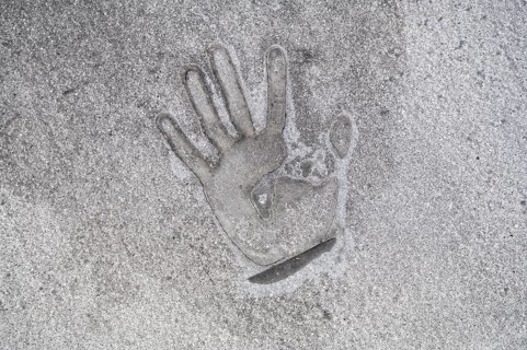 01/05/2023, Berlin, Germany, Europe, A handprint left on the tarmac with superglue a few days after