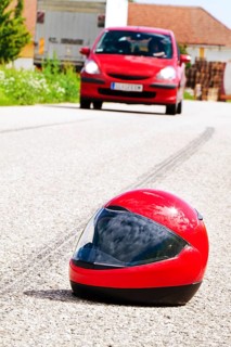 An accident involving a motorbike. Traffic accident with skid mark on road Symbol photo. Austria