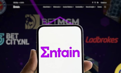 Dhaka, Bangladesh- 28 Nov 2024: Entain logo is displayed on smartphone.Entain plc is an