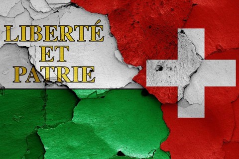 Flags of Vaud canton and Switzerland painted on cracked wall
