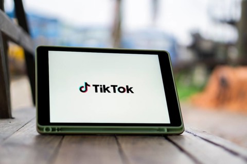 Tik Tok logo on smartphone