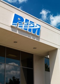RIM sign on Research in Motion company headquarters building against blue sky. Waterloo, Ontario,